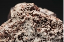 Aragonite and quartz  on Hematite