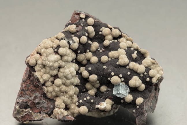 Aragonite on Hematite