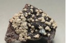 Aragonite on Hematite