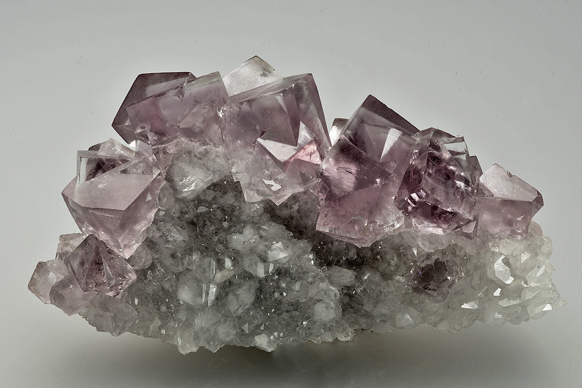 Fluorite on quartz, 340 level, Cambokeels mine, Eastgate, Weardale. 90x50x30